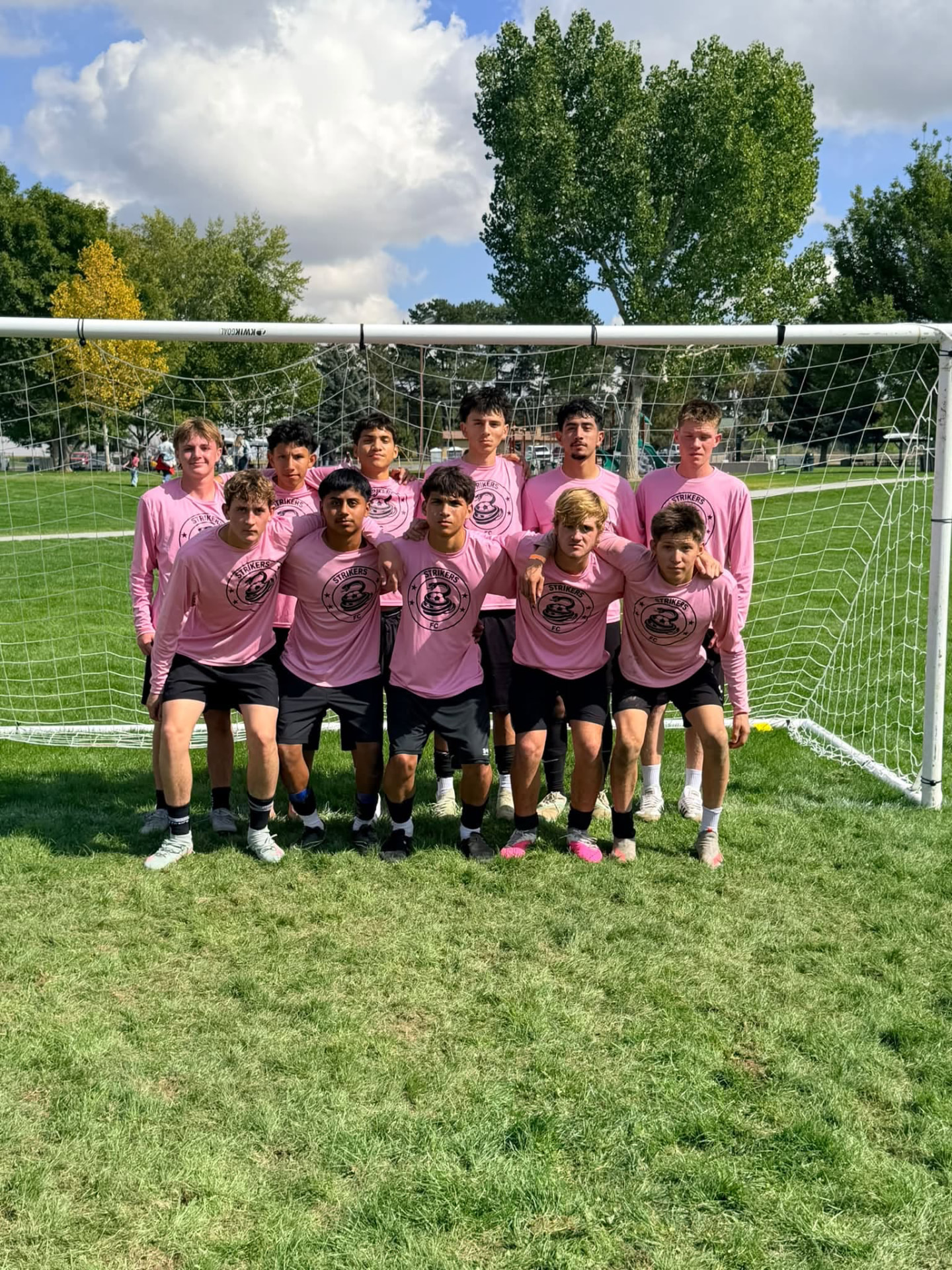 A team in pink jerseys at Copa Tricolor
